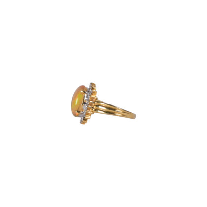 18-karat Gold Opal and Diamond Rings